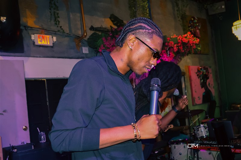 Performer holding a microphone